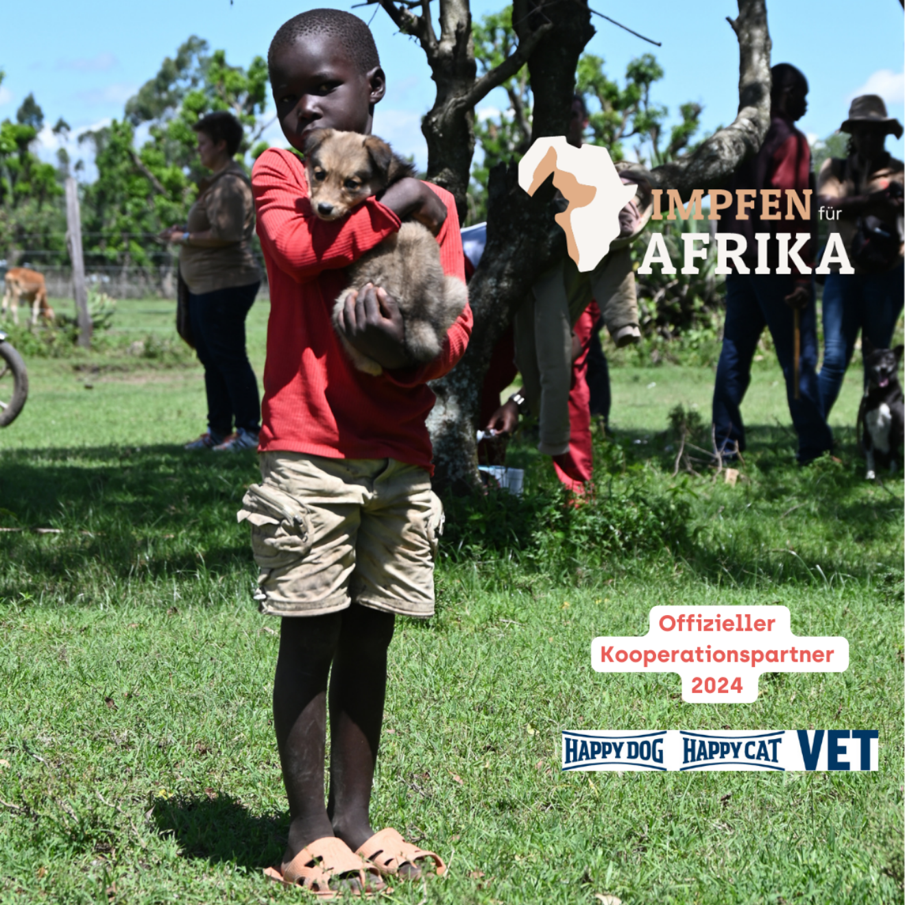 Junge mit Welpe Impfaktion Masai Mara